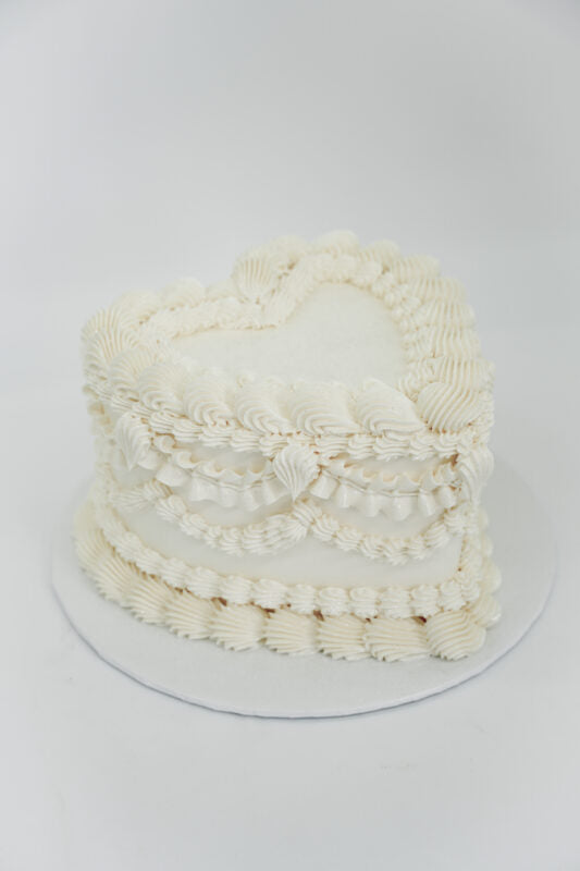 https://www.velvetlanecakes.com/wp-content/uploads/2024/01/108-Heart-white-luster-scaled.jpeg