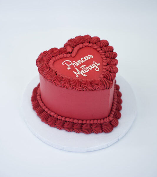 Vintage heart birthday cake in red or pink